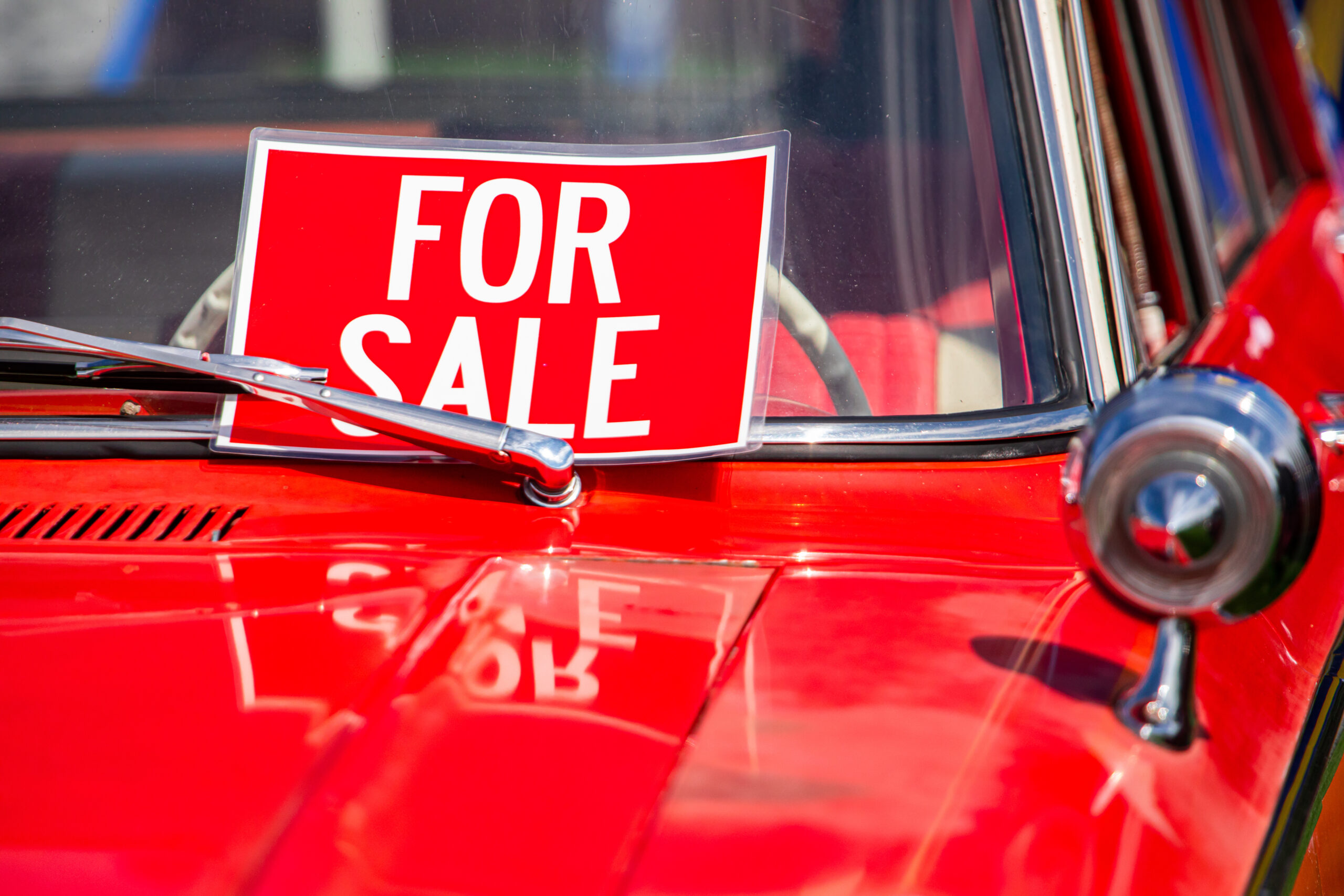 FOR SALE red sign on classic antique car